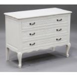 A late 20th century white painted chest of three drawers, raised on cabriole legs, height 76cm,