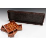 A 19th century Indian carved hardwood rectangular gallery tray, worked with overall foliage,