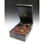 An early 20th century HMV black cased portable gramophone with a No. 4 reproducer, length 41cm,