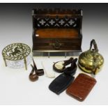 A late Victorian walnut pipe rack, fitted with a drawer, width 30cm, together with a carved