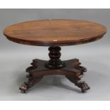 An early Victorian mahogany circular tip-top breakfast table, the turned column above a