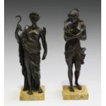 A pair of 19th century Continental brown patinated cast bronze figures of classical maidens, one