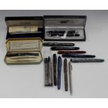 A Montblanc ballpoint pen, a Montblanc propelling action ballpoint pen, a Montblanc case, five