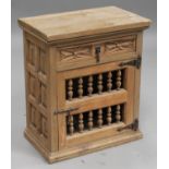 A 20th century Continental pine food hutch, fitted with a single carved drawer and a door with