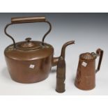 A Victorian copper kettle with overhead handle, height 30cm, an Art Nouveau copper jug by J.S & S, a