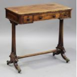 A Regency mahogany writing table, fitted with three frieze drawers, raised on pierced supports and
