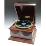 An early 20th century stained mahogany 'Concert Grande' table-top gramophone, width 44cm, together