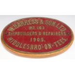 A 'W. Harkess & Son Ltd No. 163 Shipbuilders & Repairers' oval cast metal sign, dated 1905,