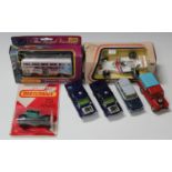 Twenty-two Corgi Toys vehicles, including two No. 497 The Man from UNCLE Thrush Buster cars, a No.