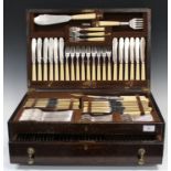 A George V part canteen of plated Beverley pattern cutlery by Poston & Co Ltd, within an oak canteen