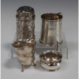 A Victorian silver sugar caster and cover of embossed cylindrical form, London 1885, height 10cm,