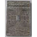 A George IV silver rectangular card case with applied filigree scrollwork decoration, Birmingham