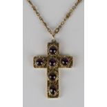 A Victorian gold and carbuncle garnet pendant cross, mounted with six carbuncle garnets within