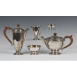 An Irish silver four-piece tea set, comprising teapot, hot water pot, milk jug and sugar bowl,