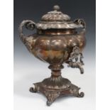 A William IV Sheffield plate samovar and cover, the lobed body flanked by a pair of foliate scroll
