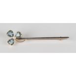 A gold, aquamarine and cultured pearl bar brooch, one end mounted with three heart shaped
