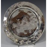 A 20th century Chinese silver circular card salver, the centre engraved with two birds perched on