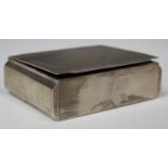 An Elizabeth II silver rectangular engine turned cigarette box, Birmingham 1960 by Mappin & Webb,