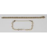 A 9ct gold bracelet in a three row curved link design, on a boltring clasp, detailed '9kt', length