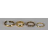 An 18ct gold decorated wedding ring, London 1971, an 18ct gold wedding ring (cut and bent), a 22ct