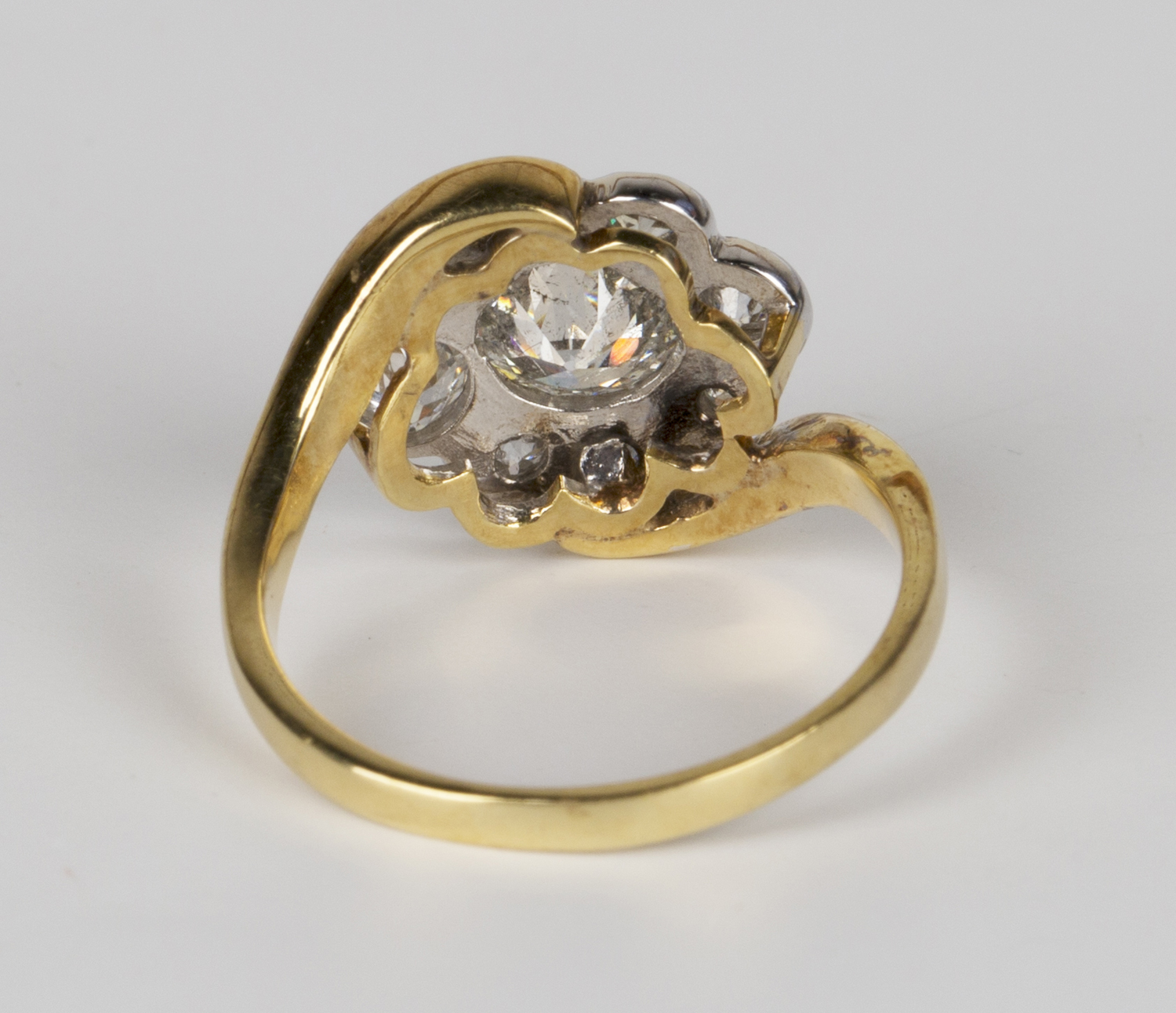An 18ct gold and diamond cluster ring, mounted with the principal cushion shaped diamond within a - Image 2 of 2