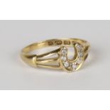 A Victorian 18ct gold and diamond ring, mounted with seven cushion shaped diamonds to the