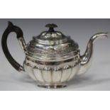 An early 19th century Russian silver bachelor's teapot, 84 zolotnik, of oval form, decorated with