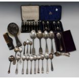 A set of six late Victorian silver coffee spoons and matching sugar tongs, London 1894, cased,