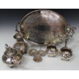 An early 20th century plated four-piece tea set of melon form with bird finials, comprising