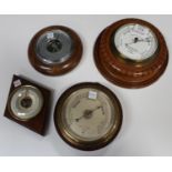 A late Victorian Negretti & Zambra circular wall barometer, the signed circular dial numbered '