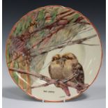 An A.J. Wilkinson Ltd Honeyglaze Kookaburra pattern pottery plate, circa 1925, titled 'Two's