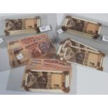 A collection of Indian banknotes.Buyer’s Premium 29.4% (including VAT @ 20%) of the hammer price.