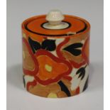 A Clarice Cliff Bizarre Orange Chintz pattern cylindrical preserve pot and cover, black printed mark