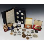 A collection of twenty-four silver Churchill Centenary medals within a fitted folder, together