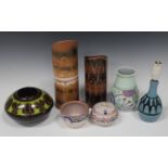 A small group of mostly Poole pottery, 20th century, including two Sienna range cylindrical vases,