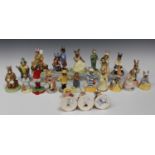 Twenty-two Royal Doulton Bunnykins figures, comprising 'Sands of Time', 'Fisherman', 'Mother', '