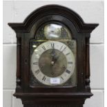 A mid-20th century oak longcase clock with eight day movement chiming on gongs, the dial with '