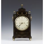 A Regency brass inlaid ebonized case bracket clock with eight day twin fusee movement striking on