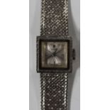 A Vulcain white gold lady's bracelet wristwatch, the signed square dial with baton hour markers at