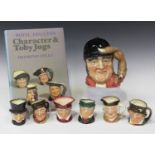 A large Royal Doulton character jug 'Gone Away', six small Royal Doulton character jugs,