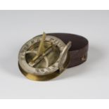 A 19th century lacquered and silvered brass pocket sundial compass, the folding gnomon and