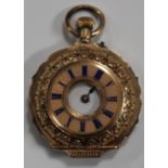 A gold and enamelled keyless wind half-hunting cased lady's fob watch with an unsigned jewelled