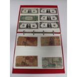 A collection of British and world banknotes, including a Bank of England five pound note, three