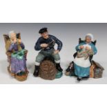 Three Royal Doulton figures, comprising 'Nanny', HN2221, 'A Stitch in Time', HN2352, and ' The