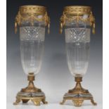 A pair of ormolu mounted cut glass vases, 19th century, each tapering body with diamond and facet