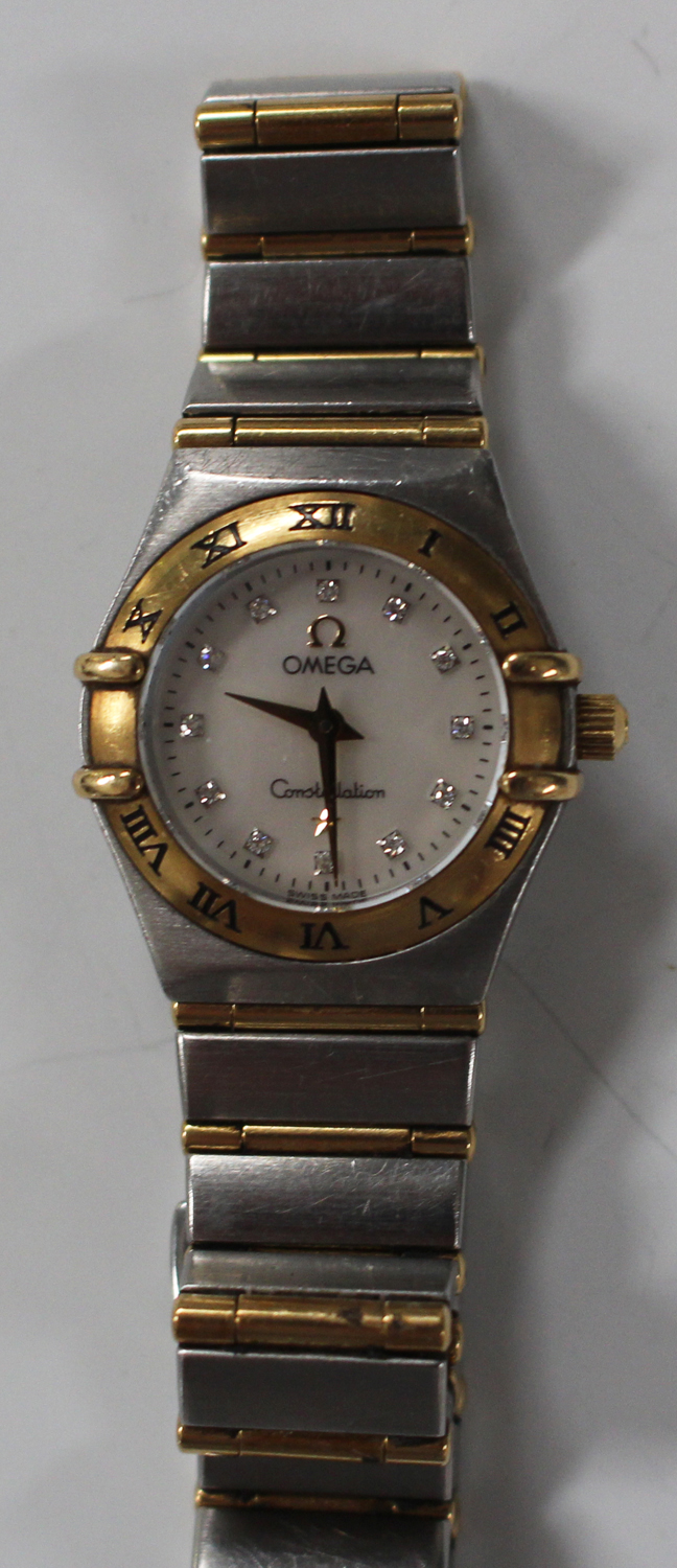 An Omega Constellation steel and gold lady's bracelet wristwatch, the signed mother-of-pearl dial