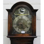 A George V oak diminutive longcase clock with eight day movement chiming on gongs, the brass break