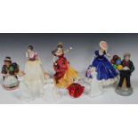 Nine Royal Doulton figures, comprising 'Balloon Girl', HN2818, 'Balloon Boy', HN2934, 'Mary',