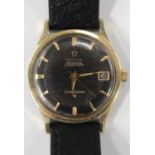 An Omega Constellation Automatic gilt metal fronted and steel backed gentleman's wristwatch, the