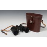 A pair of Carl Zeiss Jenoptem 10x50w binoculars, cased.Buyer’s Premium 29.4% (including VAT @ 20%)